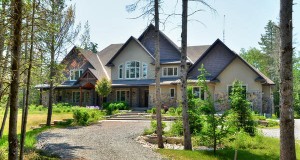 REAL ESTATE…with a difference: Carrie Underwood’s Canada House!