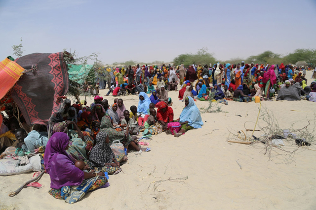 Thousands of people, mainly women and children, are scattered across the arid land of Nguigimi, Niger, after fleeing Boko Haram violence in Nigeria. Photo credit: WFP Niger/Vigno Hounkanli.
