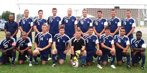 The Canadian Forces Base Kingston Men's Soccer Team on August 9, 2013 with team captain and manager, Master Corporal Ezrick Bernard (Left, kneeling in front row). Photo provided by Bernard.