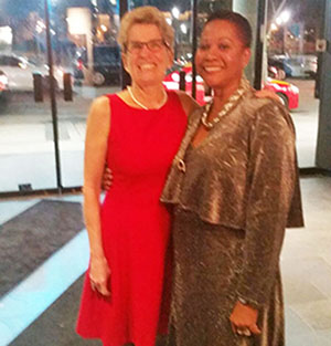 Premier Wynne, left, upon her arrival at the ACAA gala, is greeted by Donna Van Cooten, a registered nurse, who is the wife of ACAA founder and CEO, Michael Van Cooten.