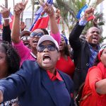 Haitian Protesters Voice Outrage Over Trump’s Reported Racist Remarks