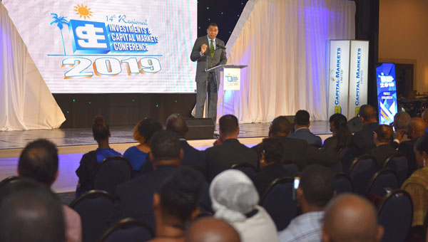 PM Urges Jamaicans To Buy Shares In Public Companies