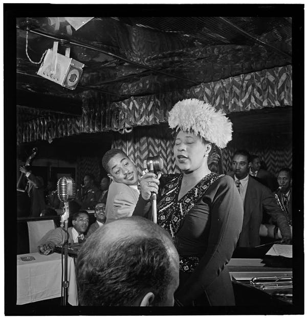 Portrait of Ella Fitzgerald, Dizzy Gillespie, Ray Brown, Milt (Milton) Jackson, and Timmie Rosenkrantz, Downbeat, New York, N.Y., ca. Sept. 1947. Photo credit: William P. Gottlieb Collection (Library of Congress).