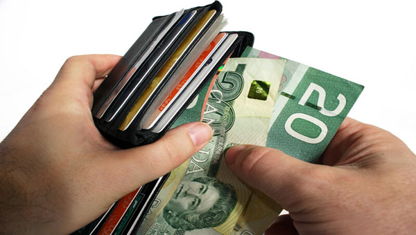CANADIAN POLLS: What Election Tax Promises Will Mean For Your Wallet