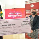 Canadian High Commissioner to Jamaica, Emina Tudakovic (right), and Jamaica's Minister of Culture, Gender, Entertainment and Sport, Olivia Grange, display a cheque of $3,075,000, donated to the Bureau of Gender Affairs (BGA), from a gift of $21 million to causes of women empowerment, at a handover ceremony, held at the High Commission of Canada in St. Andrew, yesterday. Photo credit: Yhomo Hutchinson.