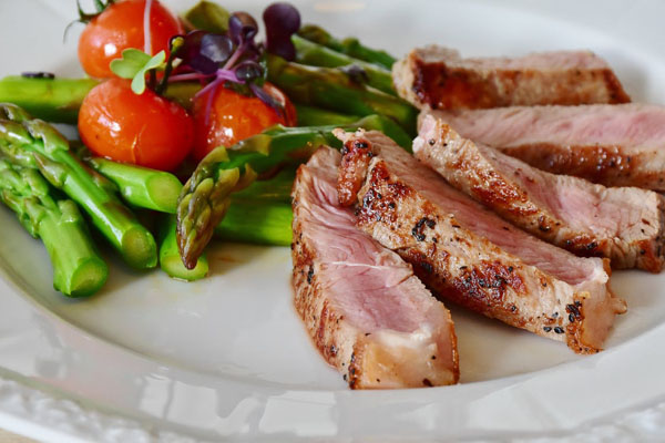 Add asparagus as a side vegetable to dress up your meat. Photo credit: pixaby/pexels.